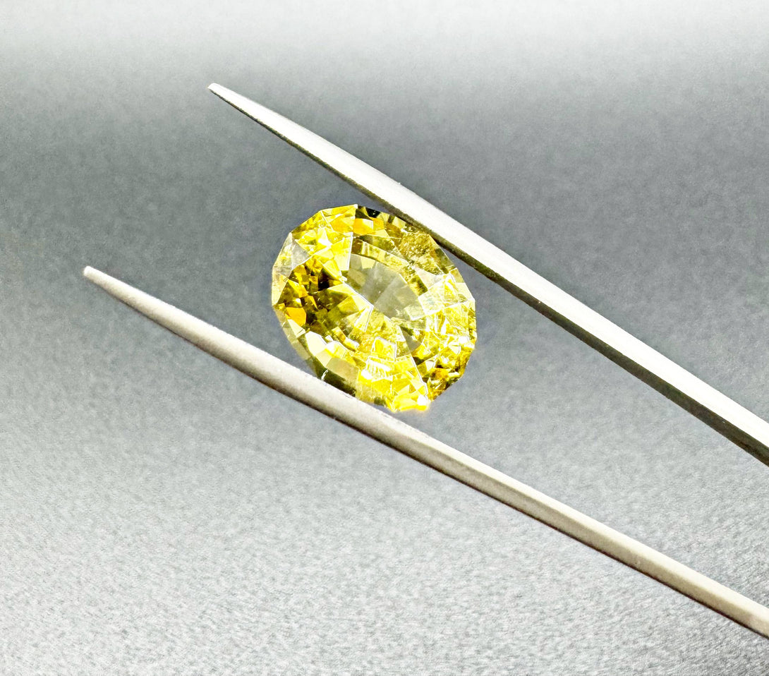 THE HELIO CRYSTAL | HELIODOR 6.78 CT FANCY OVAL MODIFIED CUT - LUVICI GEMS INTERNATIONAL