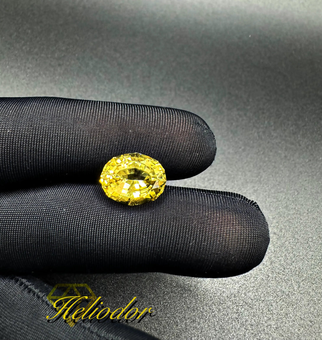THE HELIO CRYSTAL | HELIODOR 6.78 CT FANCY OVAL MODIFIED CUT - LUVICI GEMS INTERNATIONAL
