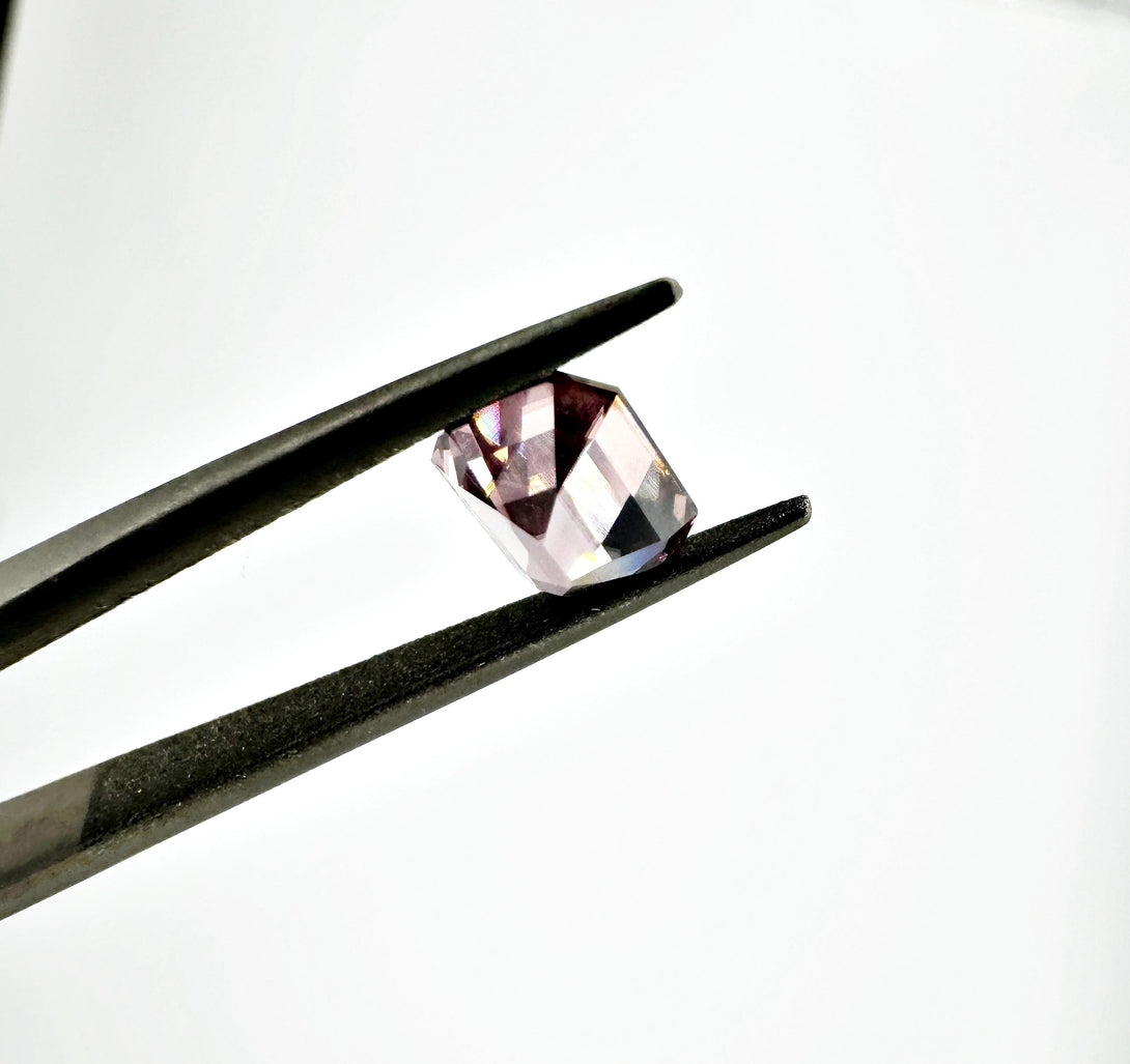The Dusty Pink Cosmic Relic | 1.54ct Emerald cut Zircon from Singida - LUVICI GEMS INTERNATIONAL