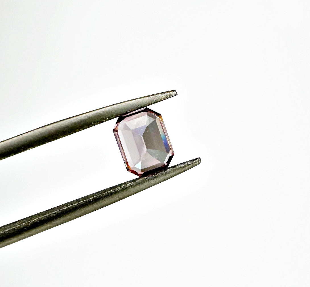 The Dusty Pink Cosmic Relic | 1.54ct Emerald cut Zircon from Singida - LUVICI GEMS INTERNATIONAL