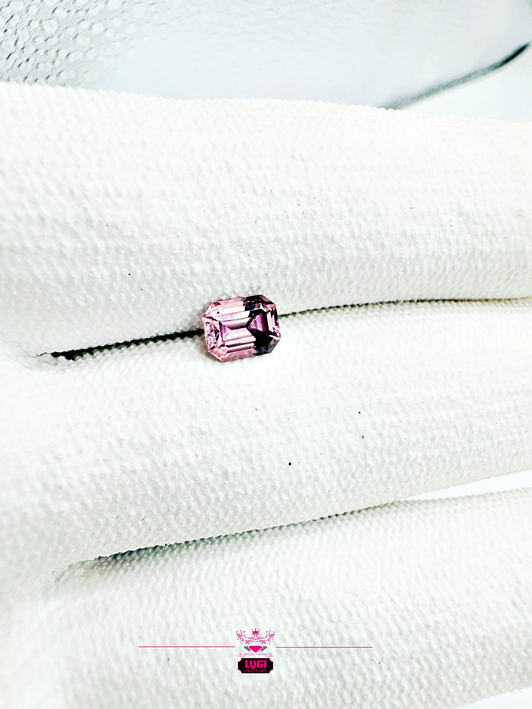 The Dusty Pink Cosmic Relic | 1.54ct Emerald cut Zircon from Singida - LUVICI GEMS INTERNATIONAL