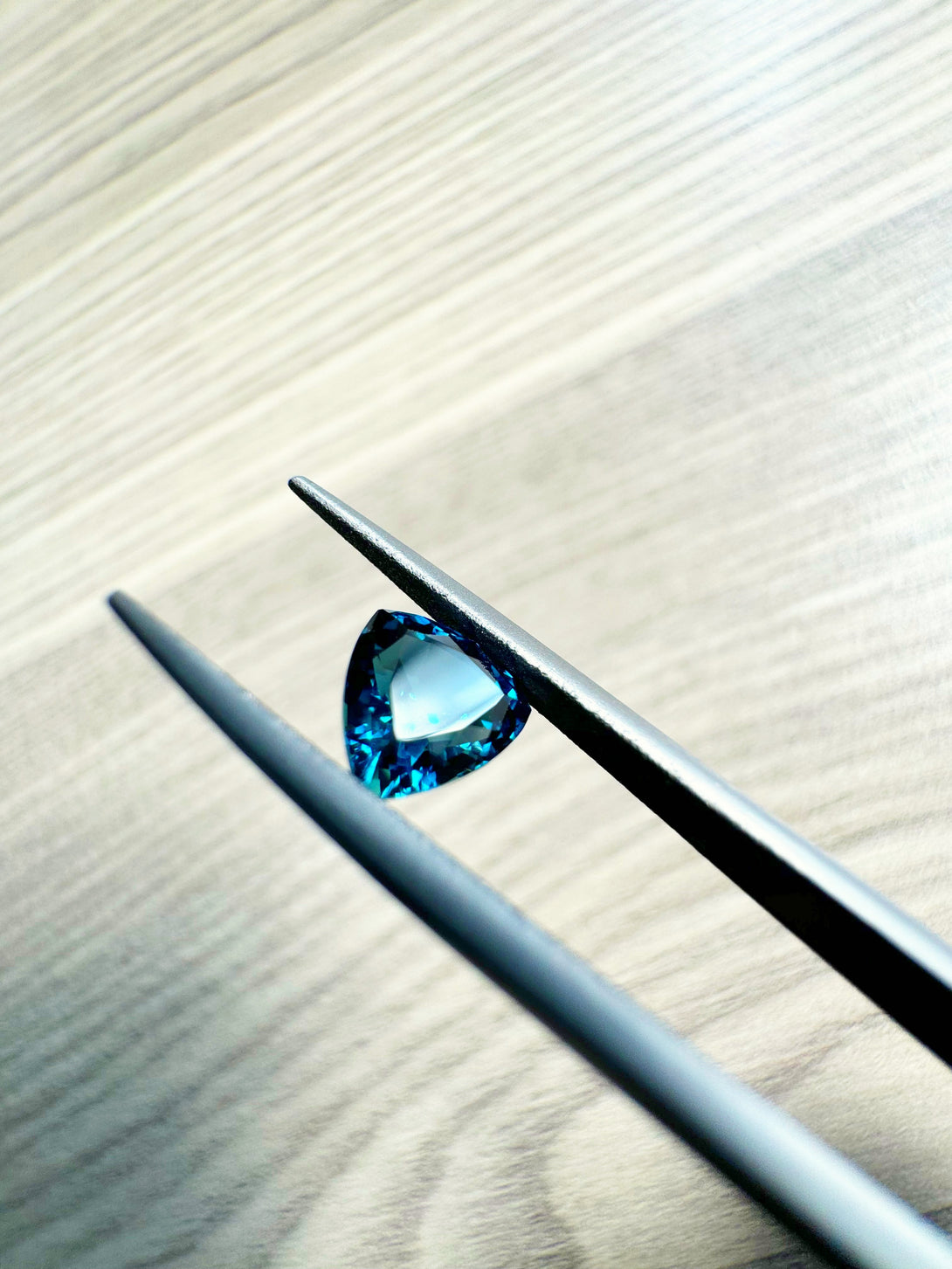RARE INK BLUE 1.46CT SAPPHIRE TRILLIANT | GARBA TULLA,KENYA - LUVICI GEMS INTERNATIONAL