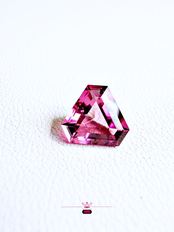 The 1.58ct starbrite Neon Pink Tourmaline | Triangle Fantasy Cut - LUVICI GEMS INTERNATIONAL