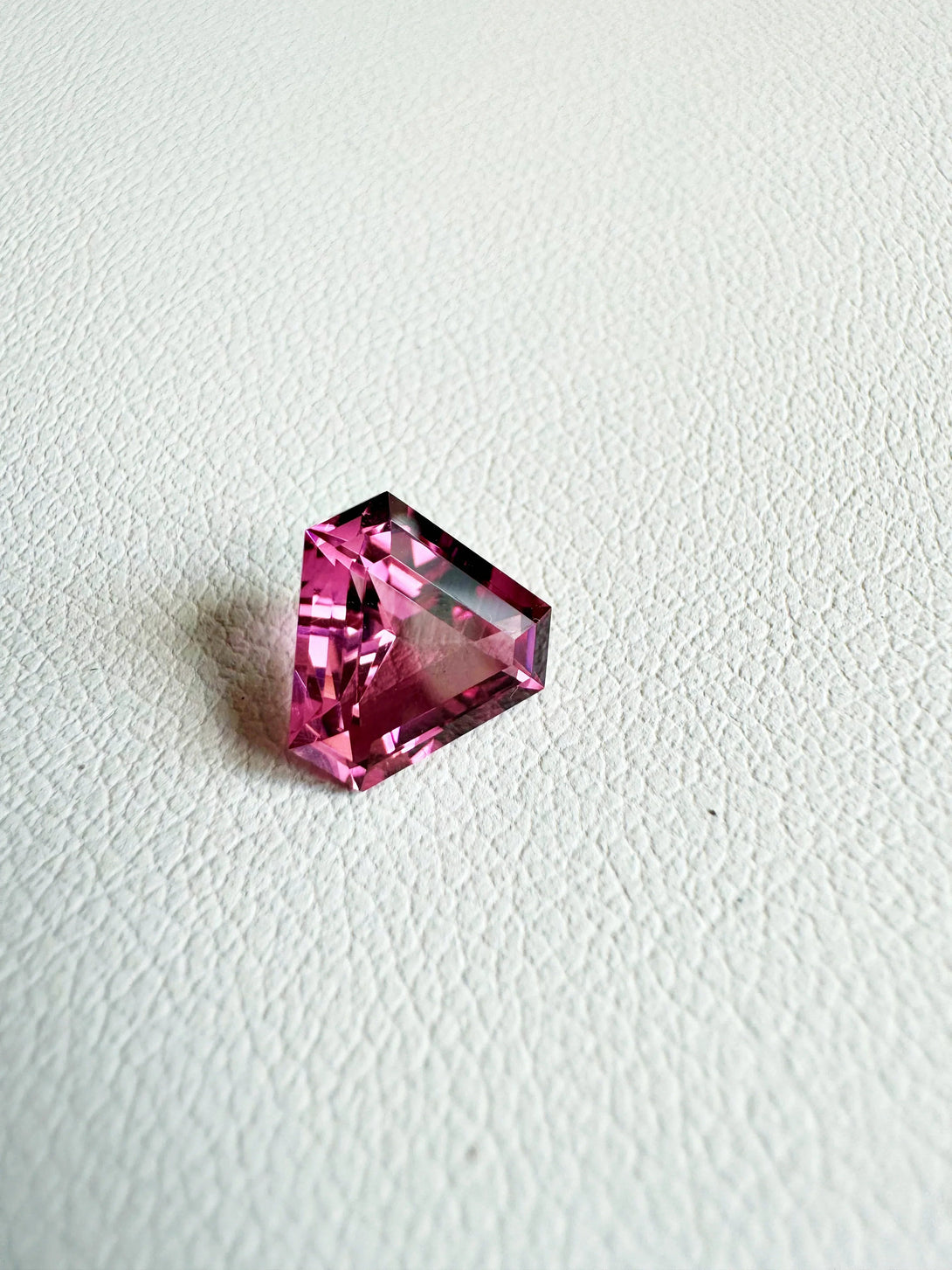 The 1.58ct starbrite Neon Pink Tourmaline | Triangle Fantasy Cut - LUVICI GEMS INTERNATIONAL