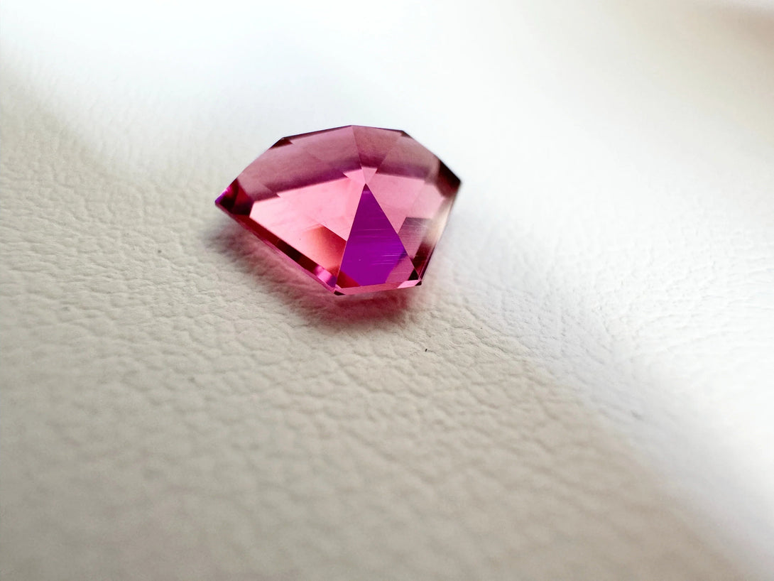 The 1.58ct starbrite Neon Pink Tourmaline | Triangle Fantasy Cut - LUVICI GEMS INTERNATIONAL