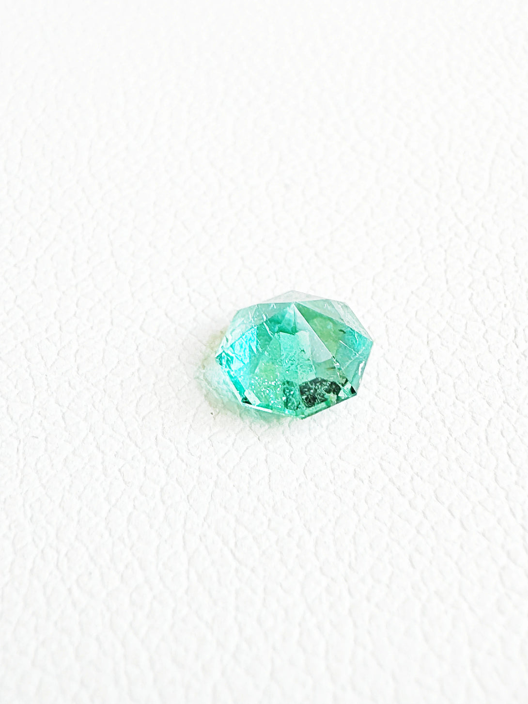 Turquoise whispers from Seba boru | 0.65ct Octagon Emerald - LUVICI GEMS INTERNATIONAL