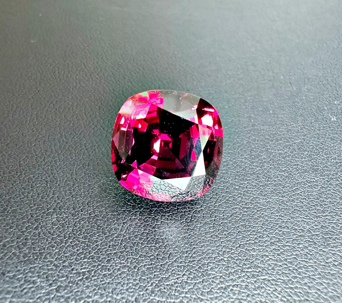 18.44ct Tanga Rhodolite Cushion Garnet | A Rhapsody in Raspberry - LUVICI GEMS INTERNATIONAL