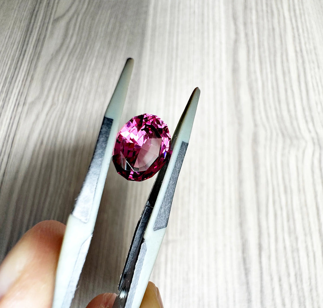 MAJESTIC RHODOLITE | 6.44CT OVAL TANGA RHODOLITE - LUVICI GEMS INTERNATIONAL