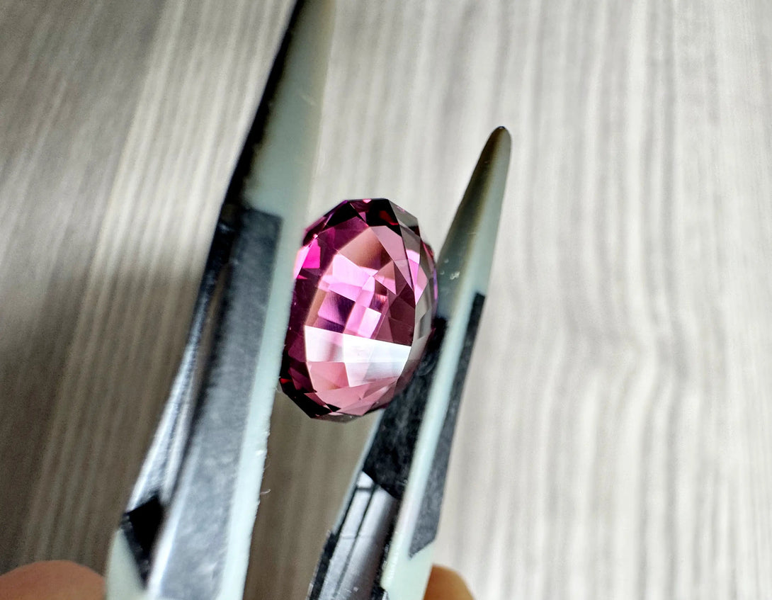 MAJESTIC RHODOLITE | 6.44CT OVAL TANGA RHODOLITE - LUVICI GEMS INTERNATIONAL