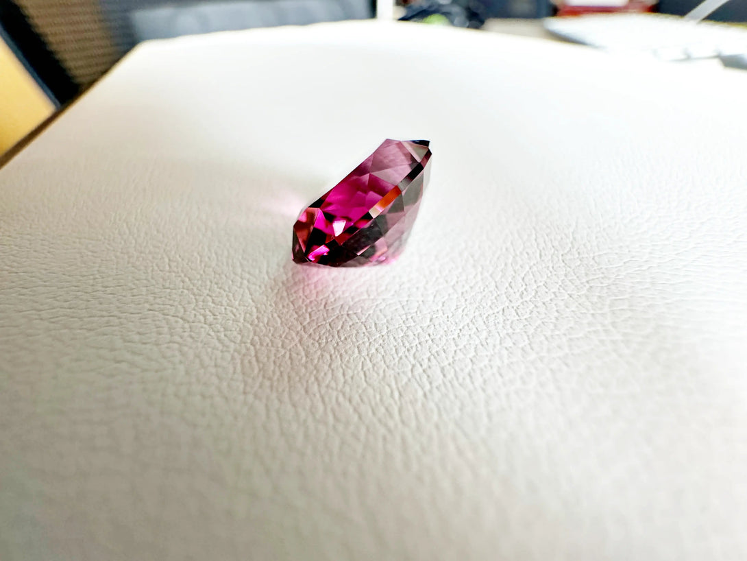 MAJESTIC RHODOLITE | 6.44CT OVAL TANGA RHODOLITE - LUVICI GEMS INTERNATIONAL