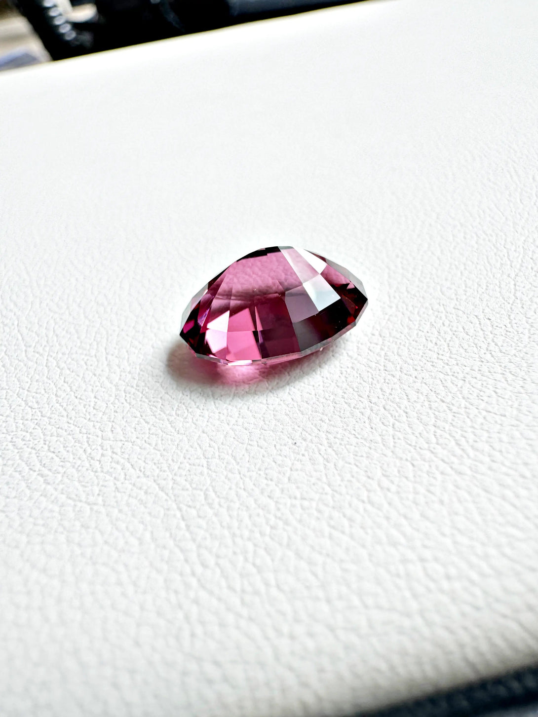 MAJESTIC RHODOLITE | 6.44CT OVAL TANGA RHODOLITE - LUVICI GEMS INTERNATIONAL
