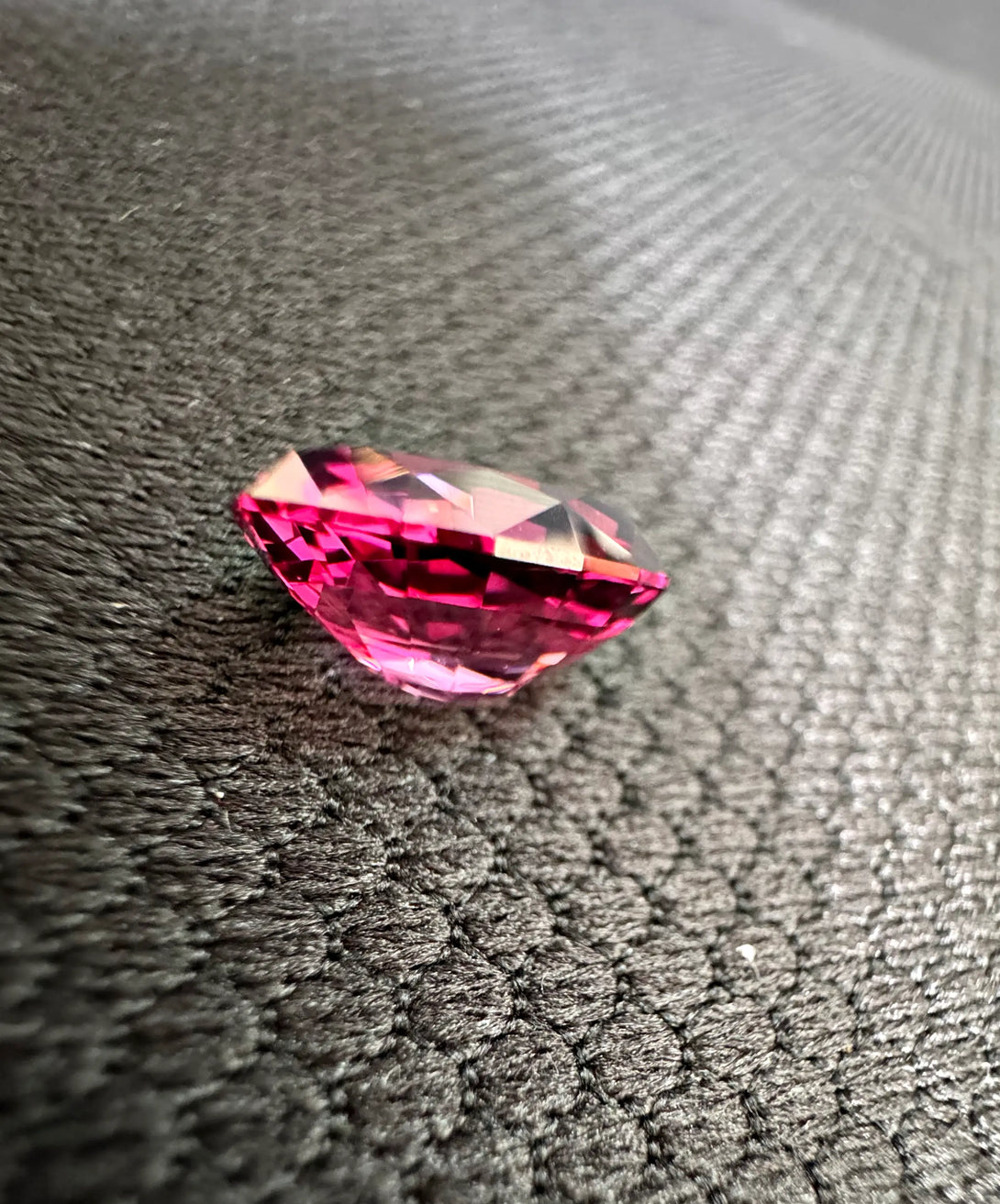 MAJESTIC RHODOLITE | 6.44CT OVAL TANGA RHODOLITE - LUVICI GEMS INTERNATIONAL