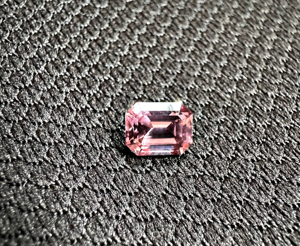 The Dusty Pink Cosmic Relic | 1.54ct Emerald cut Zircon from Singida - LUVICI GEMS INTERNATIONAL