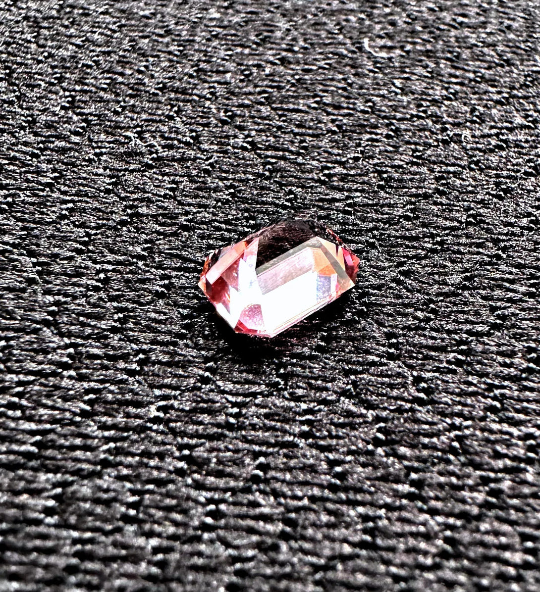 The Dusty Pink Cosmic Relic | 1.54ct Emerald cut Zircon from Singida - LUVICI GEMS INTERNATIONAL
