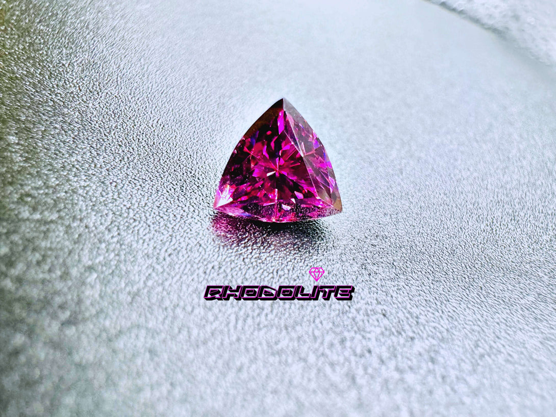 Heavenly Brilliance | 2.51 ct Rhodolite Garnet Trilliant - LUVICI GEMS INTERNATIONAL
